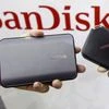 Sandisk's new portable solid state drives are displayed at the Sandisk booth during the 2015 Computex exhibition at the TWTC Nangang exhibition hall in Taipei, Taiwan
