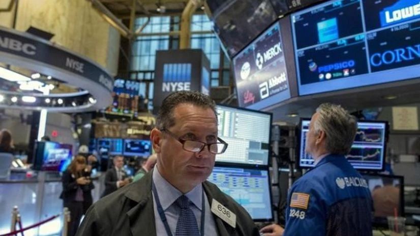 Traders work on the floor of the New York Stock Exchange Traders work on the floor of the New York Stock Exchange