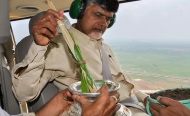 Andhra Pradesh set to get its new capital Amaravati today Soil and water being sprinkled over Amaravati