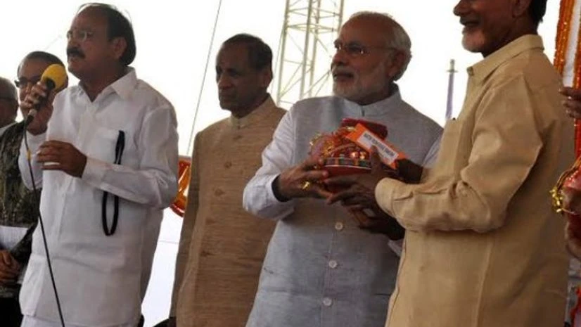 PM Modi handing over soil from Parliament complex & water from Yamuna river to Chandrababu Naidu on Amaravathi Foundation Ceremony (pic: PIB India TWitter account) PM Modi handing over soil from Parliament complex & water from Yamuna river to Chandrababu Naidu on Amaravathi Foundation Ceremony (pic: PIB India TWitter account)