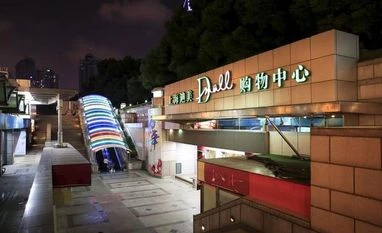 Why are malls closing in China if consumption is rising? An entrance of Shanghai Di Mei shopping centre is pictured in downtown Shanghai