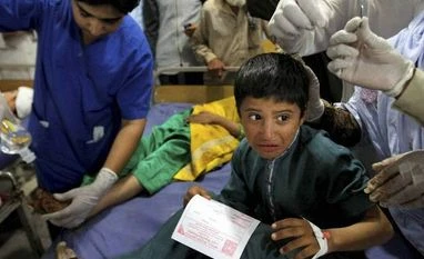 Pakistan rejects foreign aid for quake relief work Pakistani doctors treat patients at a hospital after an earthquake hit, in Peshawar, Pakistan. Photo: PTI