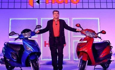 Hero eating into Honda's share in scooter market Hero Motocorp Head of Sales-Marketing & Customer Care Ashok Bhasin poses during a press conference to launch the new scooters "Duet" and "Maestro Edge" in Bengaluru