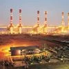 A file photo of the Dabhol power plant at night. In the absence of domestic gas supply, the plant has been shut since December 2013