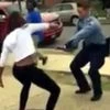 A screen grab of the video showing a US teen and cop battle in a dance-off