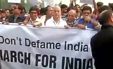 Anupam Kher leads march to Rashtrapati Bhavan, calls India a 'tolerant country' Veteran Bollywood Actor Anupam Kher leads "March for India" to Rashtrapati Bhavan (Photo: ANI)