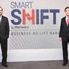 Pawan Goenka, executive director, Mahindra &amp; Mahindra, and  Anish Shah, group president (strategy), at the launch of  SmartShift