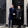 Prime Minister Narendra Modi and his UK counterpat shake hands before a delegation level meeting at 10 Downing Street in London