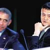 US President Barack Obama (left)  listens to remarks by Alibaba CEO Jack Ma (right) at the APEC CEO Summit in Manila on Wednesday