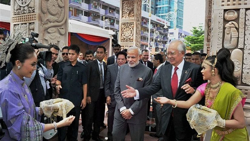 Kuala Lumpur: Prime Minister Narendra Modi and his Malaysian Counterpart Najib Razak during the inaugural ceremony of Torana Gate in Kuala Lumpur, Malaysia on Monday . PTI Photo Kuala Lumpur: Prime Minister Narendra Modi and his Malaysian Counterpart Najib Razak during the inaugural ceremony of Torana Gate in Kuala Lumpur, Malaysia on Monday . PTI Photo