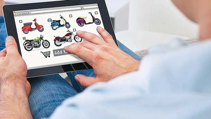 Two-wheeler makers ride the online wave Two-wheeler makers ride the online wave