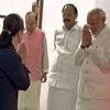 PM Narendra Modi greets Congress President Sonia Gandhi at his residence
