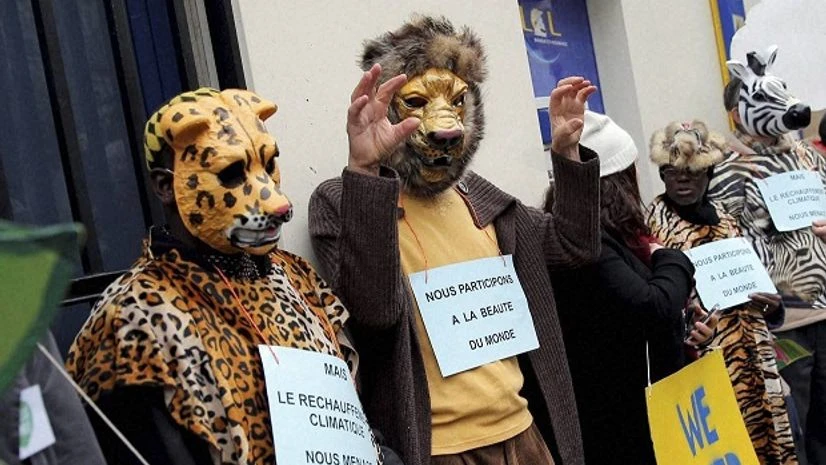 Activists form a human chain during a protest ahead of the 2015 Paris Climate Conference, in Paris, Sunday, Nov. 29, 2015. More than 140 world leaders are gathering around Paris for high-stakes climate talks that start Monday, and activists are holdi Activists form a human chain during a protest ahead of the 2015 Paris Climate Conference, in Paris, Sunday, Nov. 29, 2015. More than 140 world leaders are gathering around Paris for high-stakes climate talks that start Monday, and activists are holdi