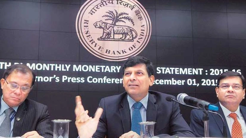 (From left) RBI Deputy Governor H R Khan, Governor Raghuram Rajan and Deputy Governor Urjit Patel during a press conference announcing the RBI monetary policy at the central bank's headquarters in Mumbai on Tuesday (From left) RBI Deputy Governor H R Khan, Governor Raghuram Rajan and Deputy Governor Urjit Patel during a press conference announcing the RBI monetary policy at the central bank's headquarters in Mumbai on Tuesday