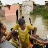 People being rescued from inundated Kotturpuram locality after heavy rains in Chennai