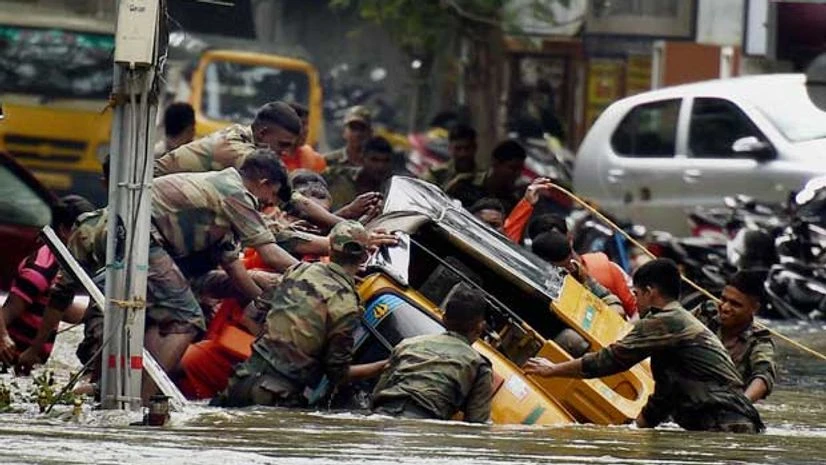 Army men during a rescue operation in Chennai after heavy rainfall on Thursday, December 3, 2015 PTI Army men during a rescue operation in Chennai after heavy rainfall on Thursday, December 3, 2015 PTI