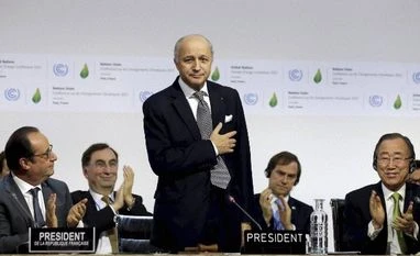French ex-FM Fabius says to step down as head of UN climate forum French Foreign Affairs Minister Laurent Fabius, center, President-designate of COP21, puts his hand over his heart after his speech as he stands near French President Francois Hollande, left, and United Nations Secretary-General Ban Ki-moon, right at