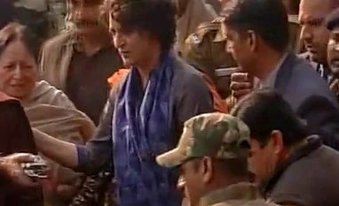 National Herald: Congress party workers gather at AICC headquarters Priyanka Gandhi Vadra at Patiala House Court. Photo: ANI