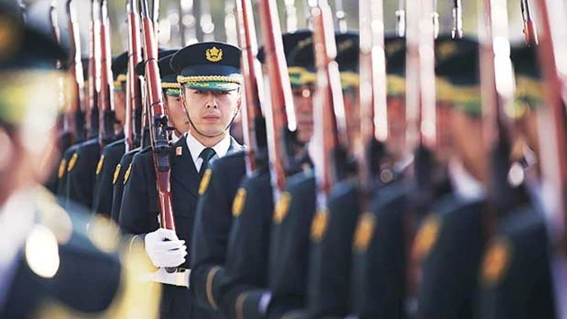 Japanese defence forces prepare for a ceremony at the Defense Ministry in Tokyo Japanese defence forces prepare for a ceremony at the Defense Ministry in Tokyo