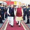 Prime Minister Narendra Modi (right) is received by his Pakistani counterpart, Nawaz Sharif, upon his arrival in Lahore on Friday
