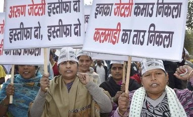 Jaitley running away from probe, misinterpreting report: AAP Aam Aadmi Party (AAP) activists staging a protest demanding resignation of Union Finance Minister Arun Jaitley over the alleged irregularities in the Delhi and District Cricket Association (DDCA) in Gurgaon