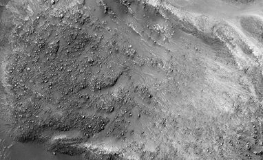 NASA captures landslide on Mars A boulder-covered landslide along a canyon wall on Mars is seen in this High Resolution Imaging Science Experiment. (Photo: NASA's Twitter Handle)