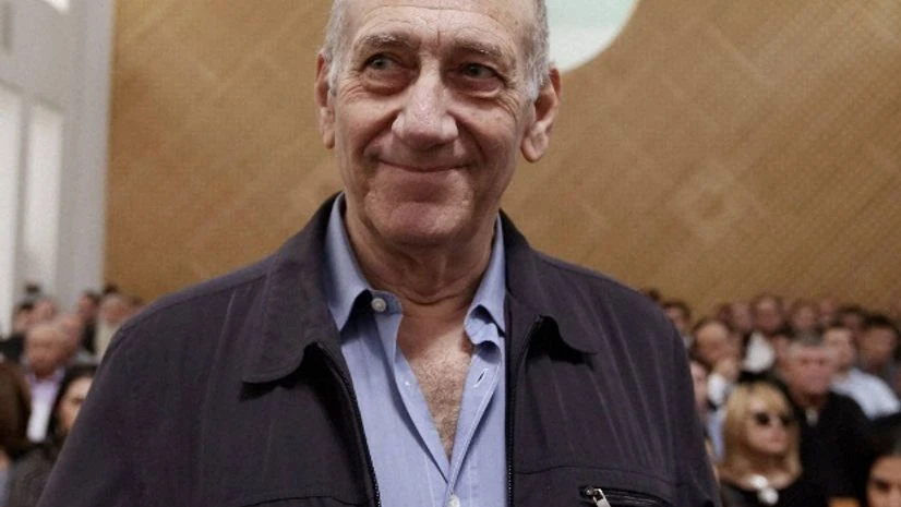 ormer Israeli prime minister Ehud Olmert is seen in the court room as he waits for the judges at the Supreme Court in Jerusalem on Israel's Supreme Court reduced Olmert's prison sentence for a sweeping bribery scandal from six years to 18 months, pa ormer Israeli prime minister Ehud Olmert is seen in the court room as he waits for the judges at the Supreme Court in Jerusalem on Israel's Supreme Court reduced Olmert's prison sentence for a sweeping bribery scandal from six years to 18 months, pa