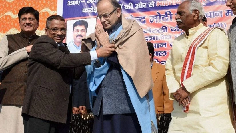 Finance Minister Arun Jaitley is felicitated at a function organised by Bharatiya Mazdoor Sangh (BMS) in New Delhi on Wednesday. Power Minister Piyush Goyal and Labour & Employment Minister Bandaru Dattatreya are also seen Finance Minister Arun Jaitley is felicitated at a function organised by Bharatiya Mazdoor Sangh (BMS) in New Delhi on Wednesday. Power Minister Piyush Goyal and Labour & Employment Minister Bandaru Dattatreya are also seen