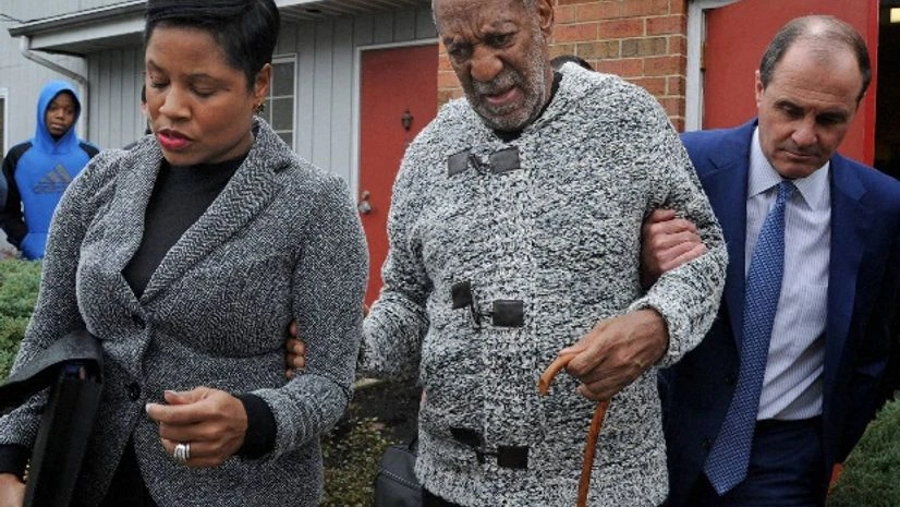 Actor and comedian Bill Cosby is helped as he leaves after a court appearance in Elkins Park, Pa Actor and comedian Bill Cosby is helped as he leaves after a court appearance in Elkins Park, Pa