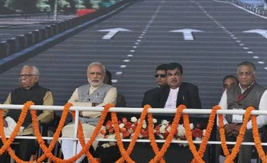 PM lays foundation stone of 14 lane Delhi-Meerut highway Prime Minister Narendra Modi with Union Road Transport and Highways Minister Nitin Gadkari, UP Governor Ram Naik and MoS VK Singh during the foundation stone laying ceremony for the construction of Delhi-Dasna-Meerut Expressway and upgradation of Das