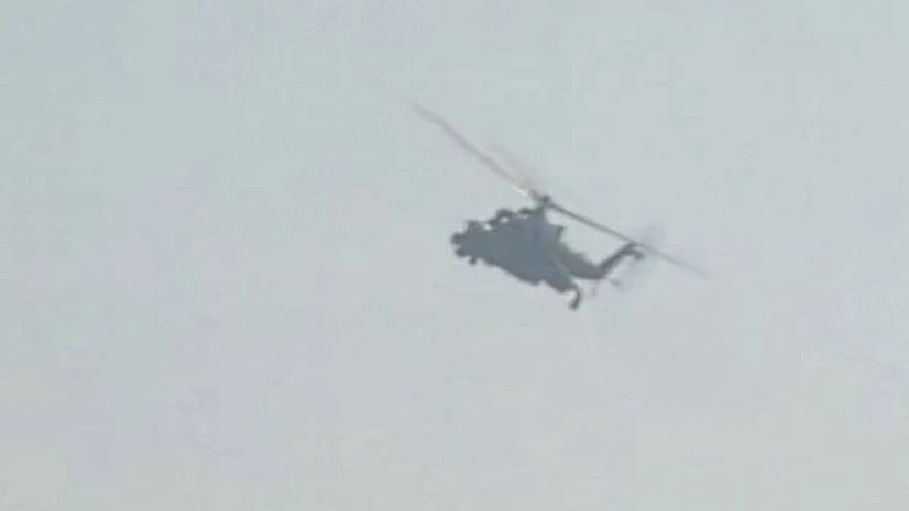 Shots fired by IAF chopper at site where terrorists are believed to be holed up. Photo: ANI Shots fired by IAF chopper at site where terrorists are believed to be holed up. Photo: ANI