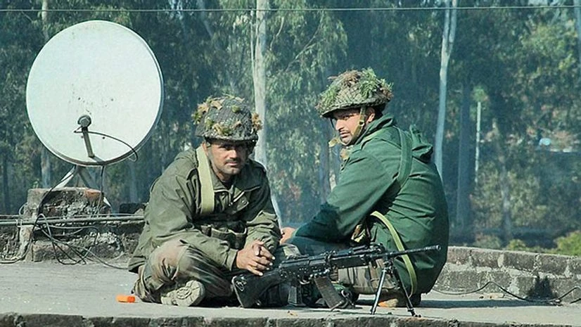 Security personnel during their operation against the militants who attacked the Indian Air Force base in Pathankot, Punjab, on Sunday. -- PTI Photo Security personnel during their operation against the militants who attacked the Indian Air Force base in Pathankot, Punjab, on Sunday. -- PTI Photo