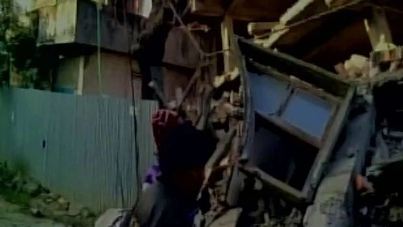 A building collapsed in Imphal after a major earthquake hit the region. Photo: ANI A building collapsed in Imphal after a major earthquake hit the region. Photo: ANI