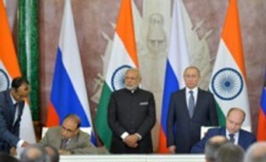Tata Power and Russian government officials sign the MoU in Moscow Tata Power and Russian government officials sign the MoU in Moscow