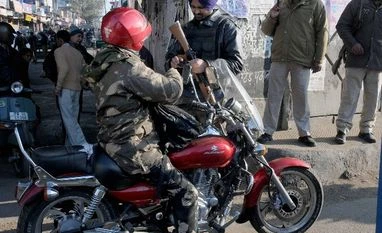 Post-Pathankot scenario similar to post-Mumbai: Pakistani daily Security forces personnel checking the identity of IAF employees near the Indian Air Force base where an operation against militants is carried out in Pathankot