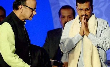 Kejriwal has a 'warped and degenerate mindset': Jaitley Finance Minister Arun Jaitley and Delhi Chief Minister Arvind Kejriwal at the Bengal Global Business Summit in Kolkata on January 8, 2016. PTI Photo