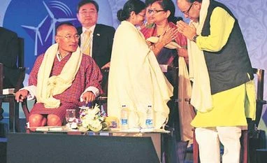 Business, politics go hand in hand at Bengal summit West Bengal Chief Minister Mamata Banerjee (third from right) greets Finance Minister Arun Jaitley (right) at the Bengal Global Business Summit in Kolkata on Friday