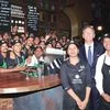 Starbucks Chairman and Chief Executive Howard Schultz (second from right) at the Starbucks Fort store in Mumbai with employees and partners