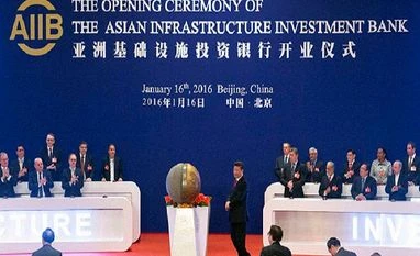 Xi Jinping launches Asian Infrastructure Investment Bank Representatives of the founding nations of the Asian Infrastructure Investment Bank (AIIB) applaud as Chinese President Xi Jinping, center, unveils a sculpture during the opening ceremony of the AIIB in Beijing.