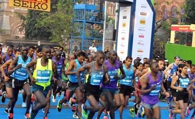 Pacemaker Kipketer wins marathon, sets new course record time Pacemaker Kipketer wins marathon, sets new course record time