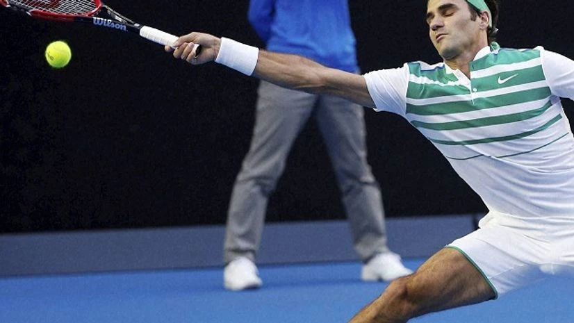 Roger Federer of Switzerland reaches for a forehand return during his first round match against Nikoloz Basilashvili of Georgia at the Australian Open tennis championships in Melbourne, Australia, Monday, Jan. 18, 2016. AP/PTI Roger Federer of Switzerland reaches for a forehand return during his first round match against Nikoloz Basilashvili of Georgia at the Australian Open tennis championships in Melbourne, Australia, Monday, Jan. 18, 2016. AP/PTI