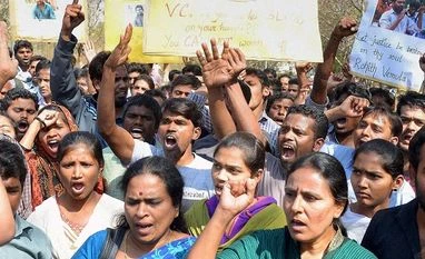Roopanwal Panel starts hearing on University of Hyderabad incidents Students staging a protest over the death of Rohith Vemula, a doctorate student at the Hyderabad Central University who was found hanging in a hostel room, in Hyderabad on Monday. PTI Photo
