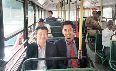 Don't just be a winner, be a champion: Uber boss Uber CEO Travis Kalanick (left) on his way to IIT-Bombay in a BEST bus on Tuesday