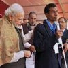 Prime Minister Narendra Modi distributing aid &amp; assistive devices to 'Divyang' (physically challenged) children at a function, in Varanasi