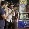 Congress Vice President Rahul Gandhi lights a candle near a memorial of Rohith Vemula to pay him tributes during a visit to University of Hyderabad where the students are agitating, in Hyderabad