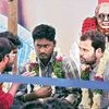 Congress  Vice-President Rahul Gandhi (right) interacts with students agitating over Rohith Vemula's death at University of Hyderabad on Saturday