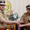 Outgoing Mumbai Police Commissioner Javed Ahmed (R) greets his succeeder Dattatray Padsalgikar in Mumbai on Sunday PTI