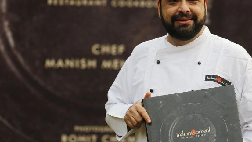 Chef Manish Mehrotra with his book Chef Manish Mehrotra with his book