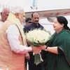 Prime Minister Narendra Modi is greeted by Tamil Nadu Chief Minister J Jayalalithaa at the Chennai airport on Friday