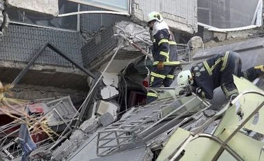 Shaking felt in Taiwan's capital Taipei as 5.6-magnitude quake hits Emergency rescue teams search for victims in a collapsed building after a 6.4-magnitude earthquake in Tainan, Taiwan. Photo: AP/PTI
